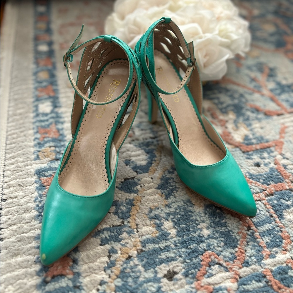 Restricted green heels